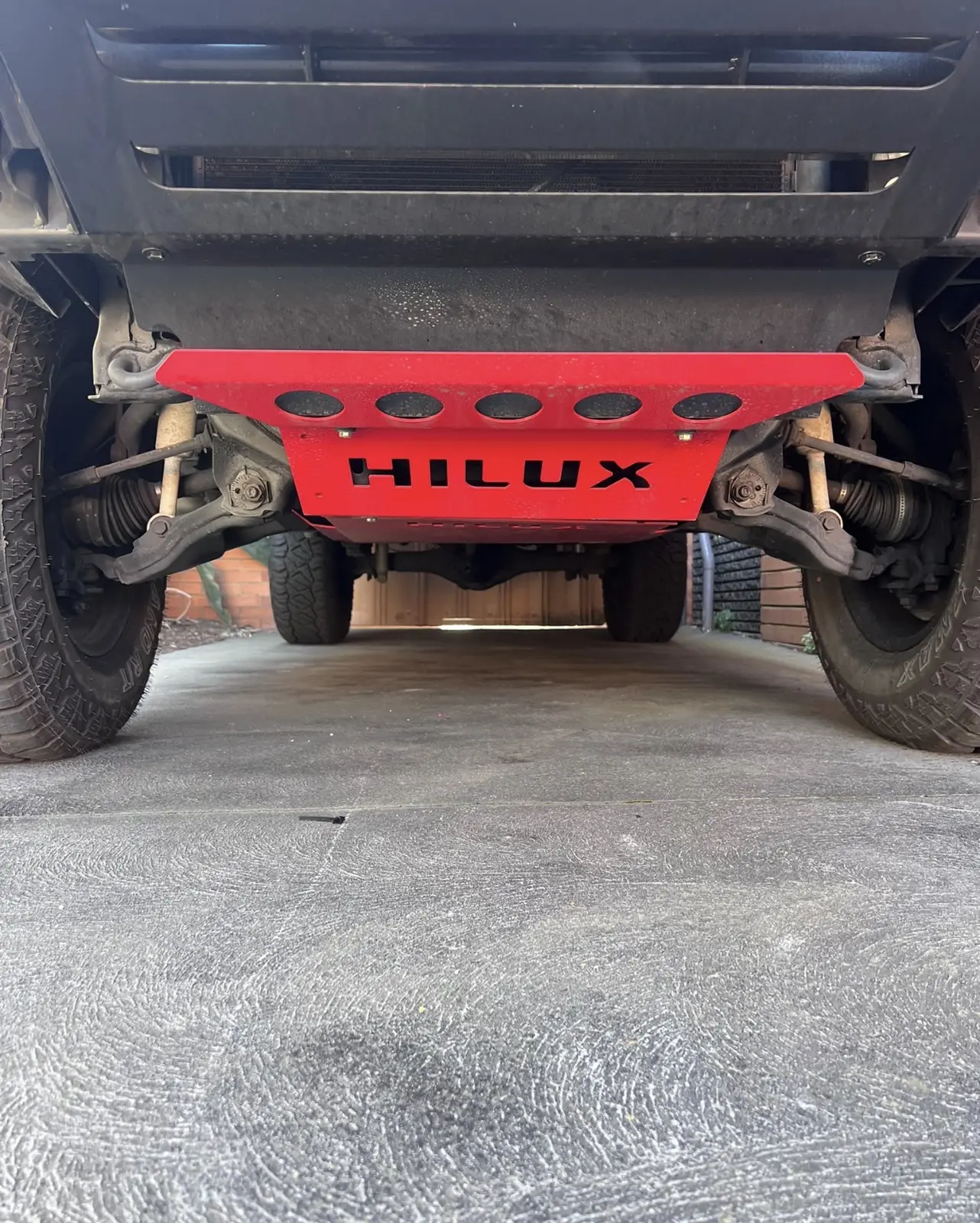 Front underbody view of the Toyota Hilux with its bash plate