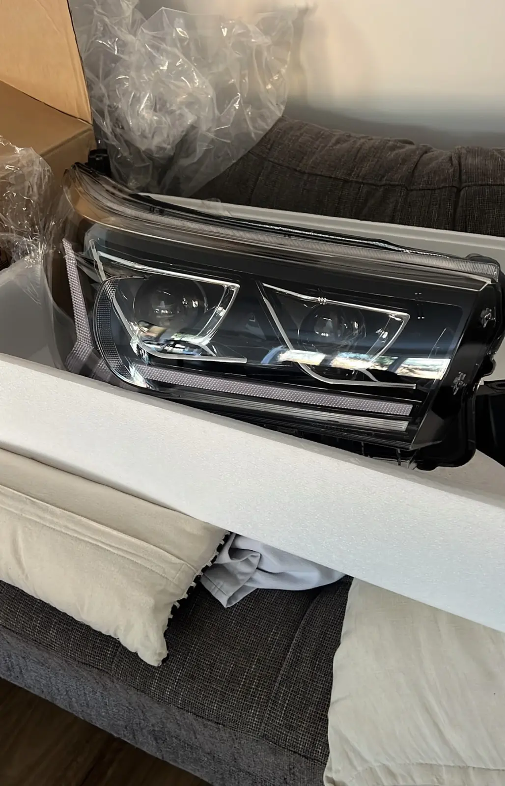 Replacement headlamp assembly prepared for the Toyota Hilux upgrade