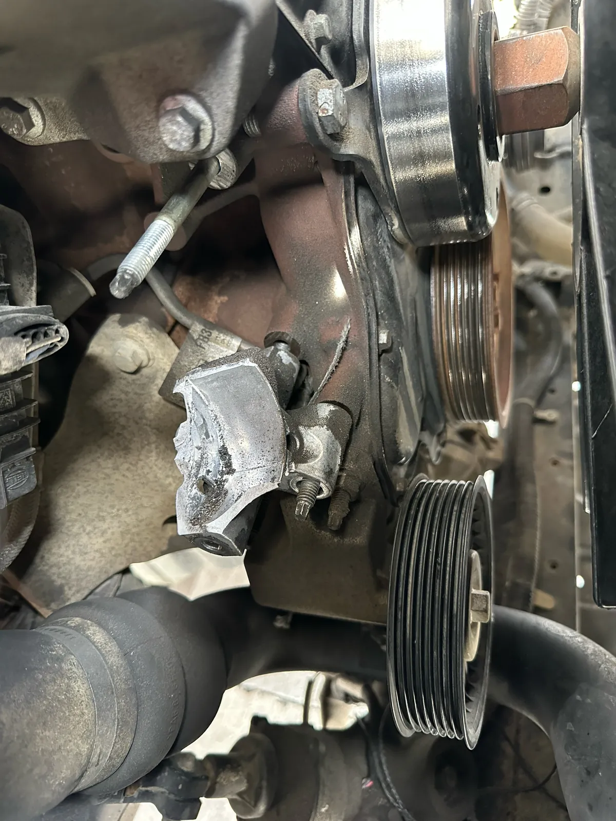Fractured tensioner mounting section at the front of the Ford Ranger engine